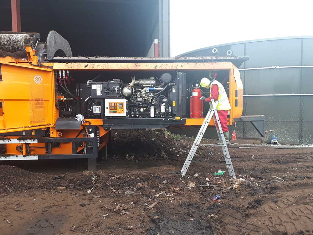 Man Installing Vehicle Fire suppression system